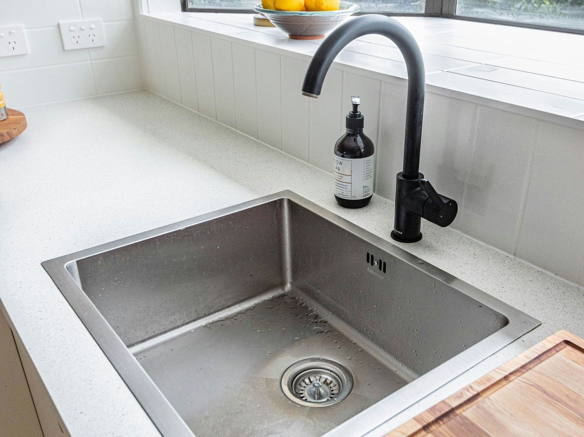 stainless steel sink with faucet